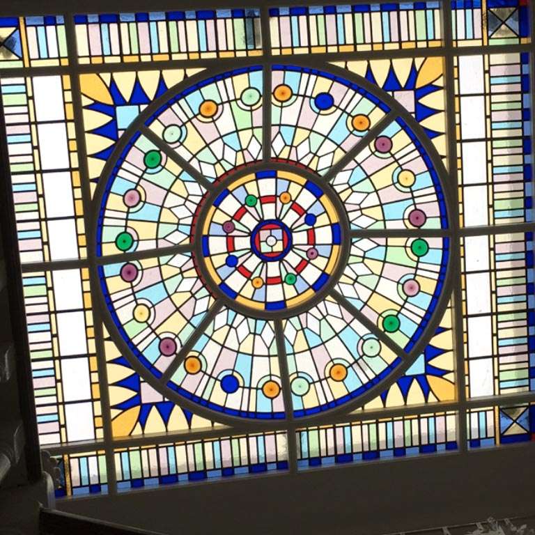 stain glass window created by traditional sash windows