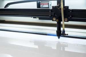 laser cutter cutting uPVC window frames